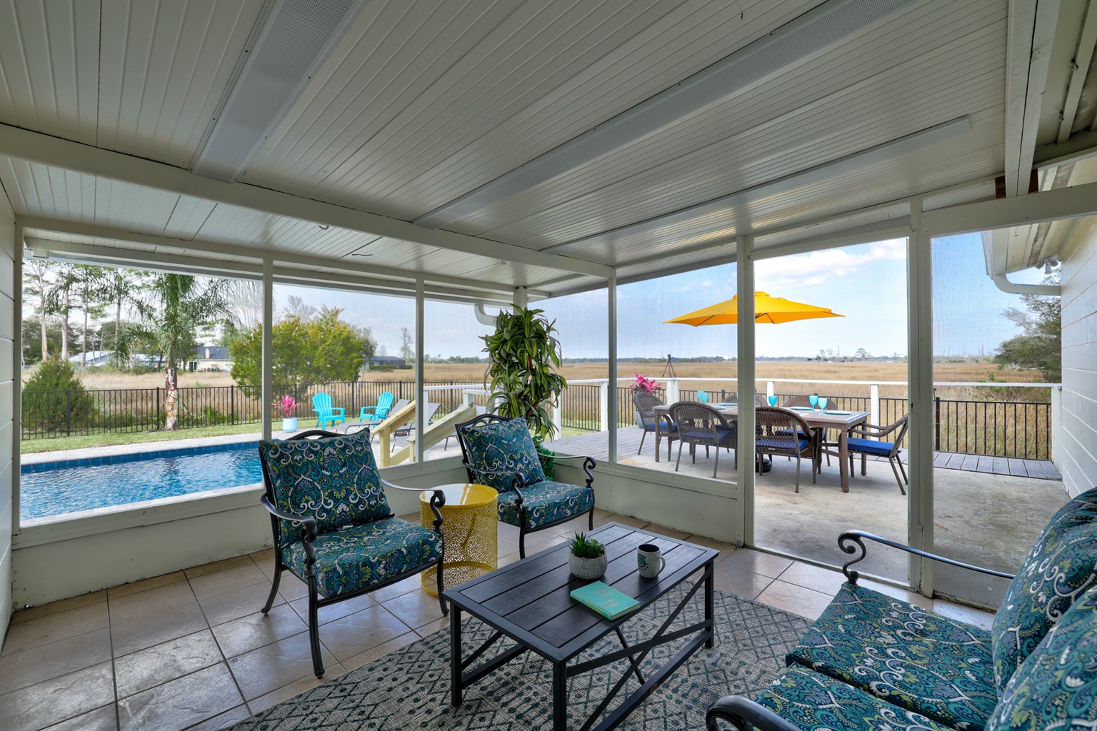 Screened lanai and outdoor dining - Marsh View: Renovated close to Mayo! Heated pool - Jacksonville Beach