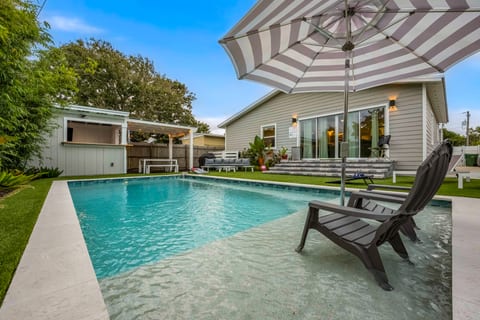 Lounge by the pool or enjoy a drink at the bar