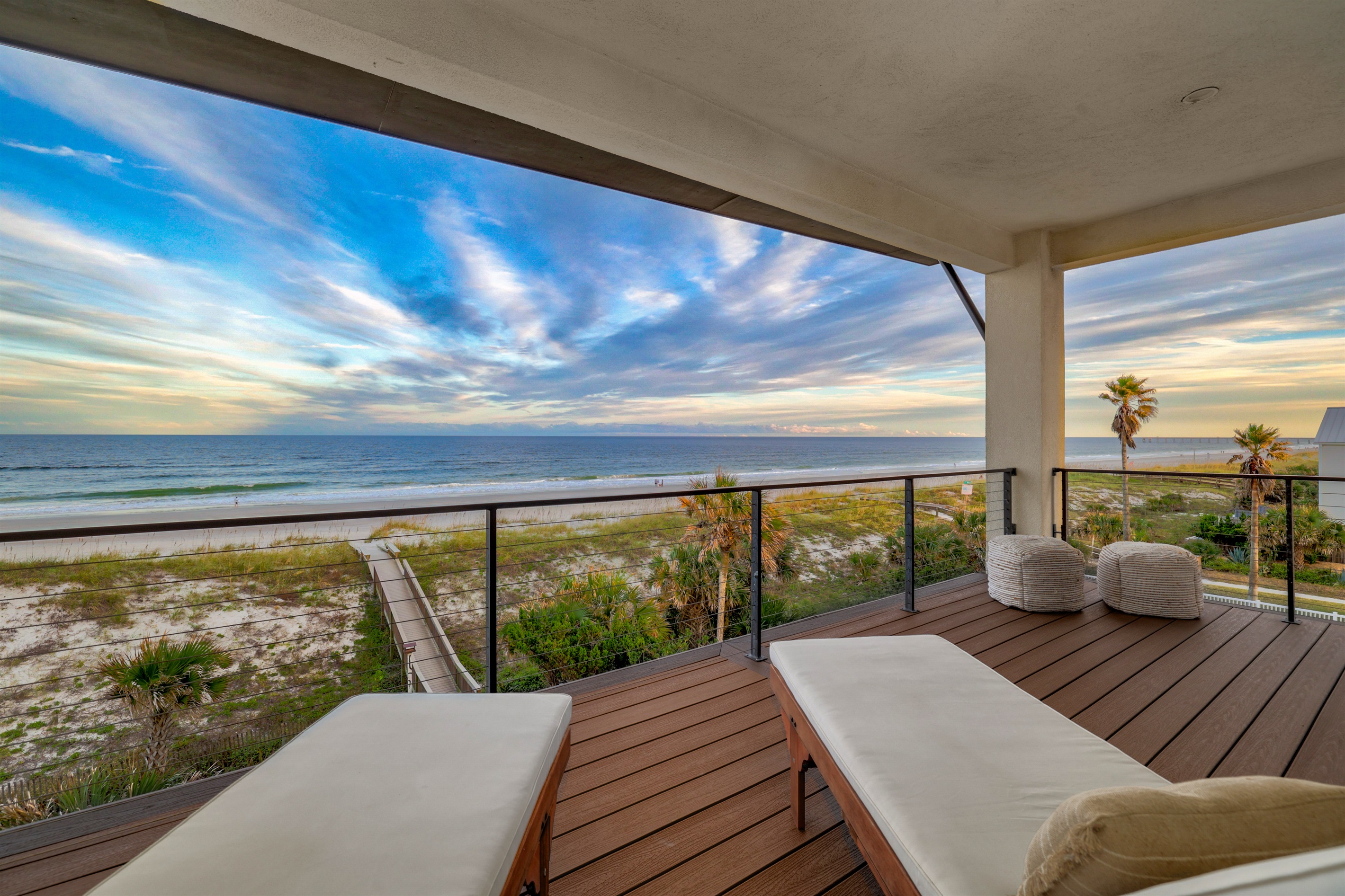 Private oceanfront balcony off primary bedroom