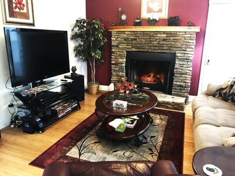 Living Room with 55" TV, Electric Fireplace w/Heater