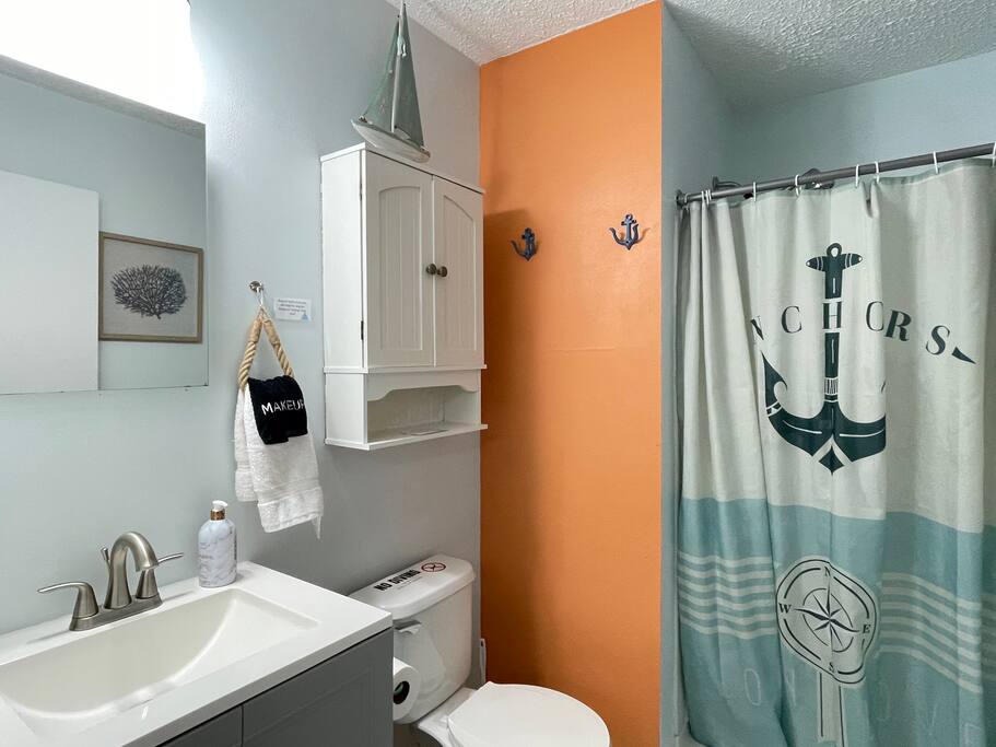 Stand up shower. In addition to central heating and air, each bathroom offers a fan forced ceiling heater to keep you cozy when coming out of the shower. - Seahorse Paddock, Ocean View, Pool, Near Boardwalk - Carolina Beach