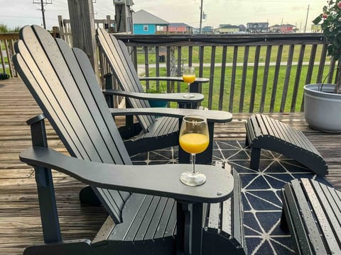 The best way to lounge—Adirondack style. Mimosa not include.
