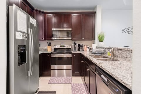 The kitchen is fully equipped with a range of amenities that will enhance your stay. These include coffee makers, blenders, crock pots, baking supplies, pots and pans, dishware, and more.