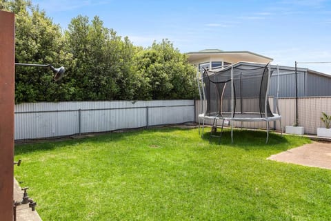 Enjoy the large grass area in the backyard for trampoline fun, backyard cricket, bocce or running around