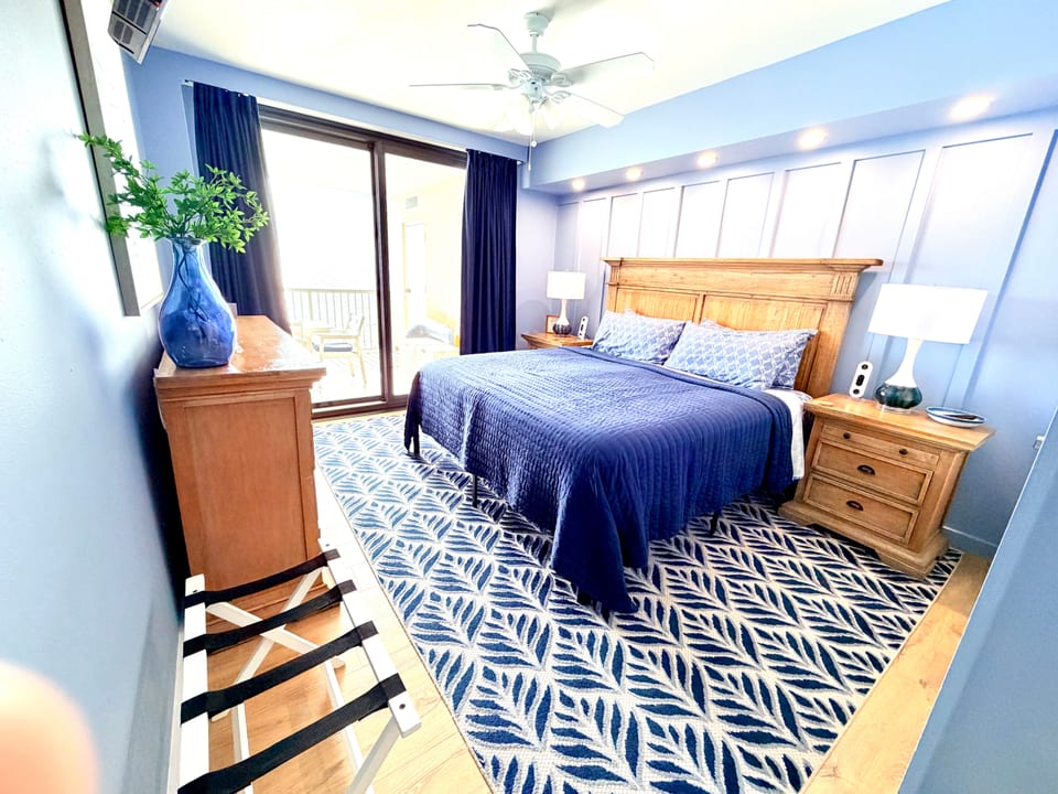 Primary bedroom with direct balcony access