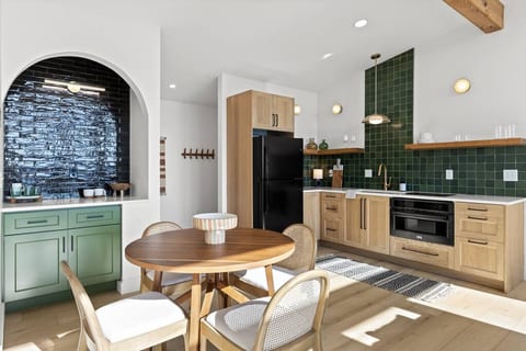 Fully stocked kitchen with cooktop and convection oven