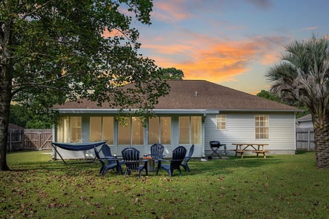 “Unwind in your own private backyard oasis — complete with a grill, picnic table, firepit, and hammock. Whether you’re sharing stories around the fire, enjoying a family cookout, or simply relaxing, this space is made for making memories.”