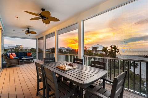 Play a game in the screened in porch with a million dollar view!