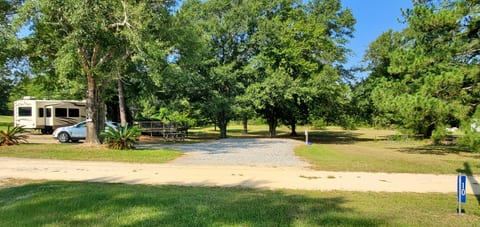 Horseshoe drive allows for extra parking.  There is plenty of room for another vehicle and boat if needed.