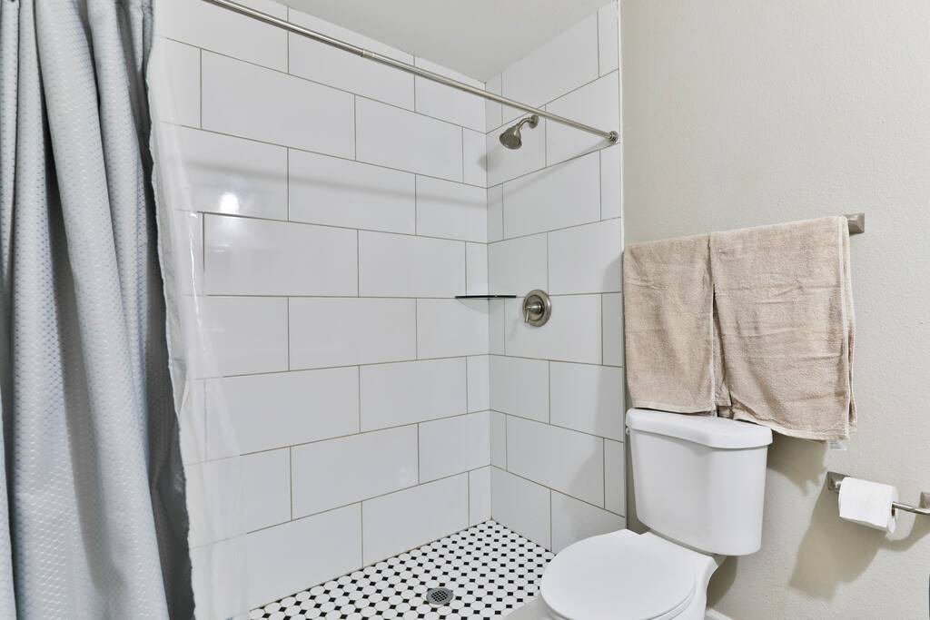 Standing shower in the master bathroom