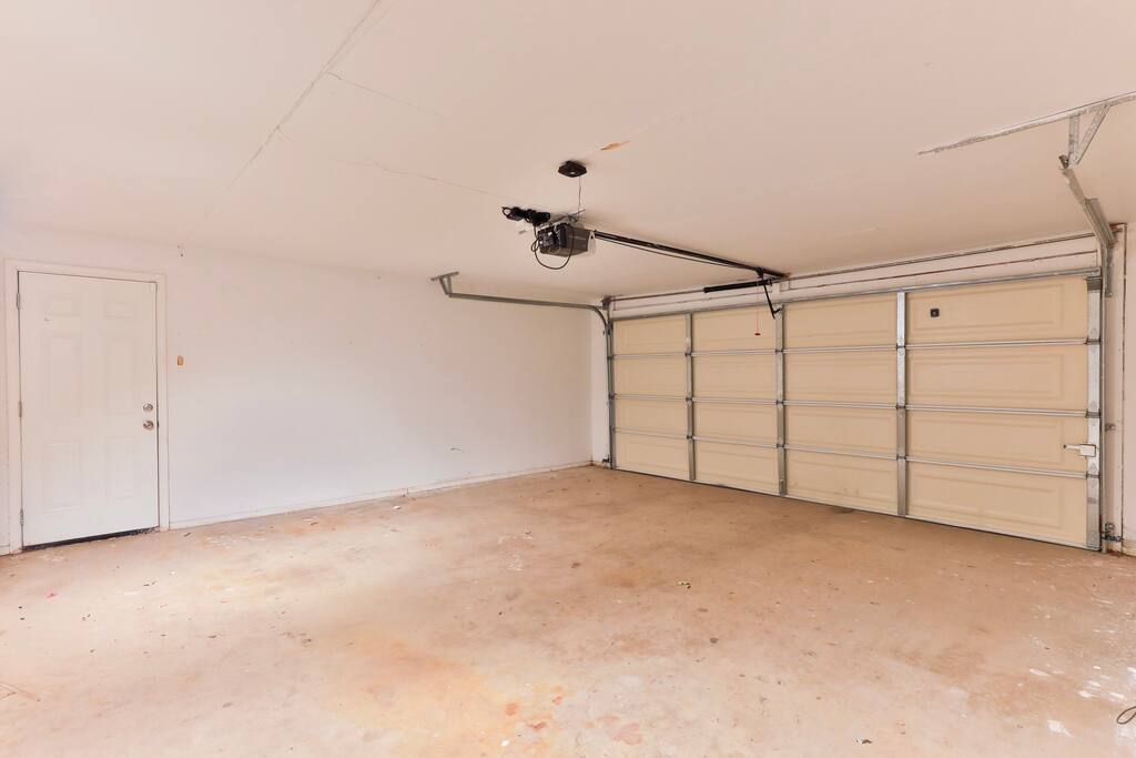 Two car attached garage with remote access