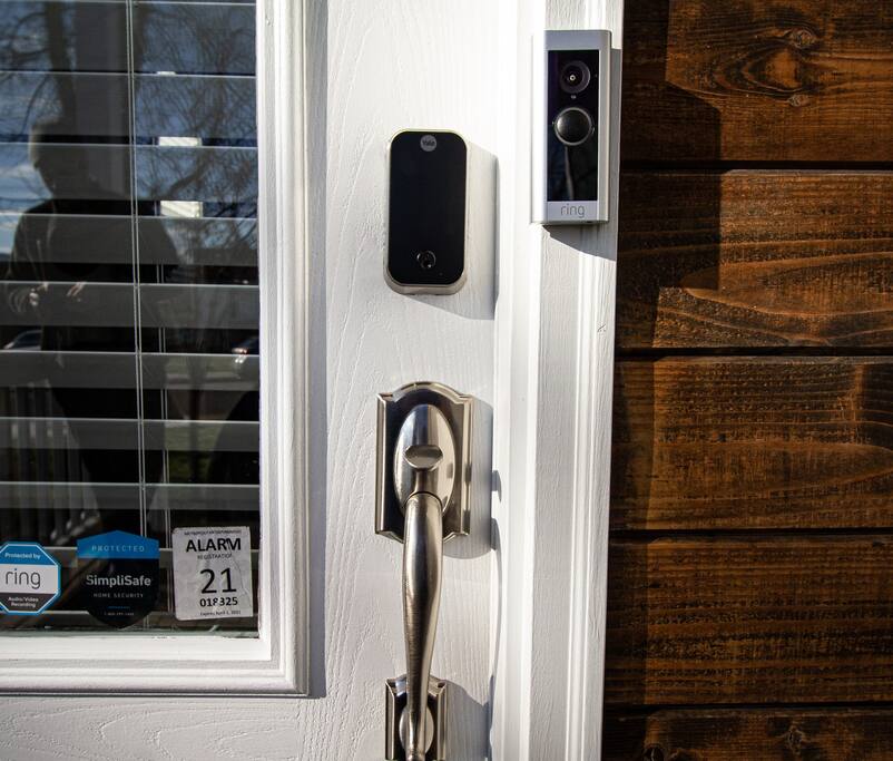 Front entry with smart locks and ring doorbell camera.