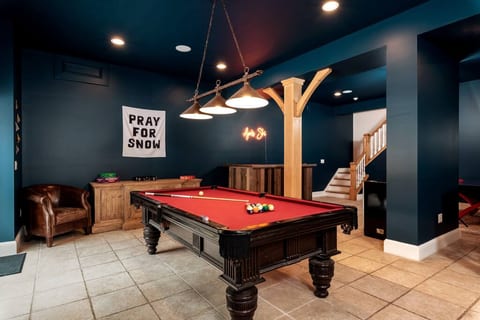 Lower level | Open concept game room, reading nook, bar, and living area
