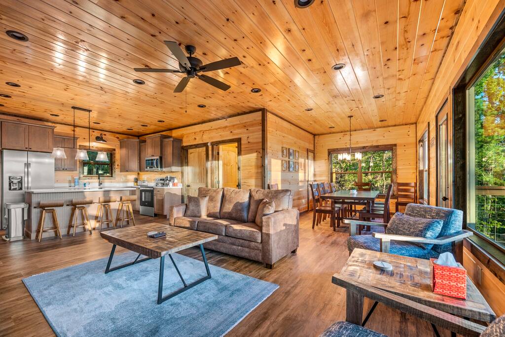 The open concept living space view featuring the living room, dinning and kitchen. The open concept living space view featuring the living room, dinning and kitchen. - Overlook Swim Lodge - Sevierville