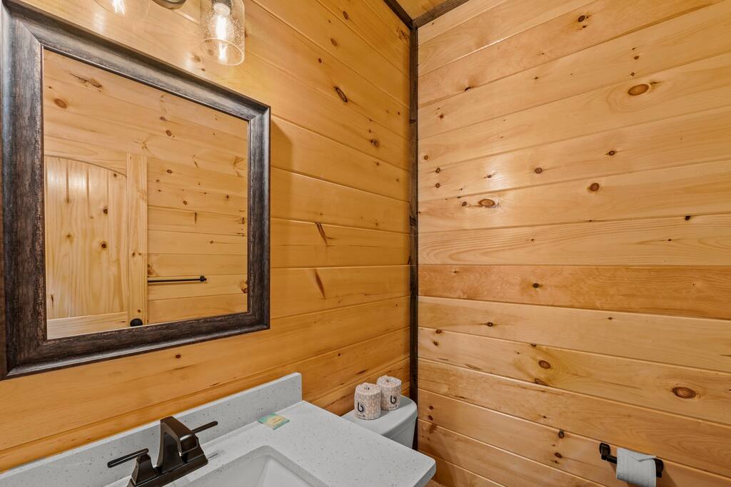 Half bathroom off the pool room and theatre. Half bathroom off the pool room and theatre. - Overlook Swim Lodge - Sevierville
