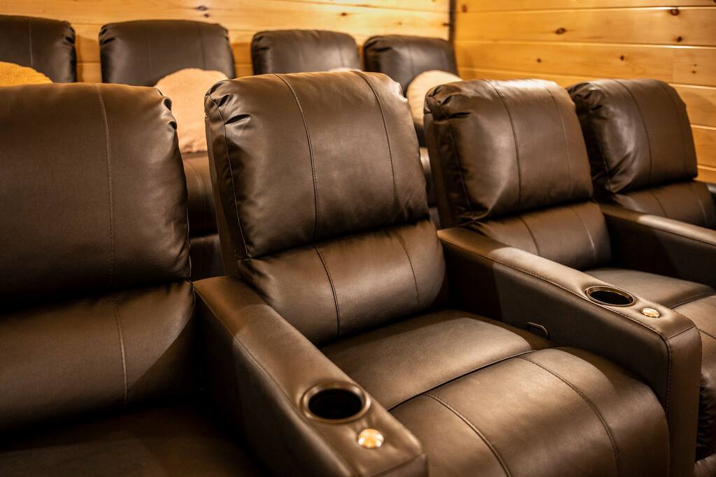 Premium leather seating with recliners are just the touch to make your movie night the best! Premium leather seating with recliners are just the touch to make your movie night the best! - Overlook Swim Lodge - Sevierville