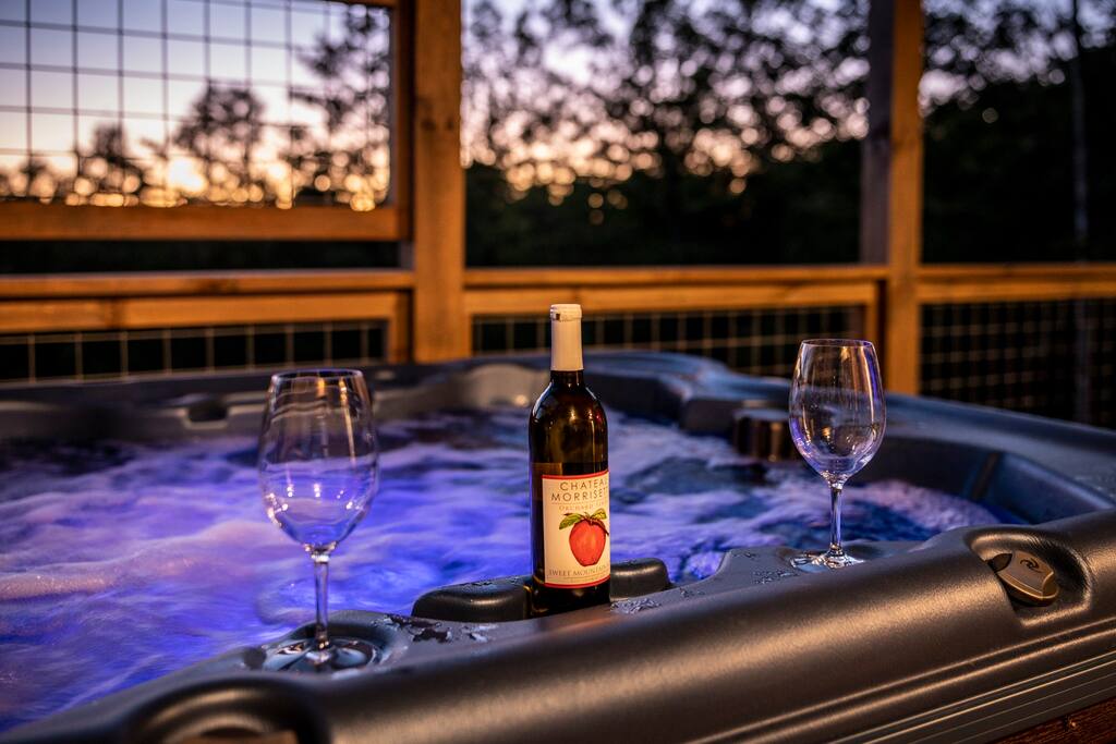 Jets, color changing lights and a glass of wine.  Just what the doctor ordered! - Overlook Swim Lodge - Sevierville