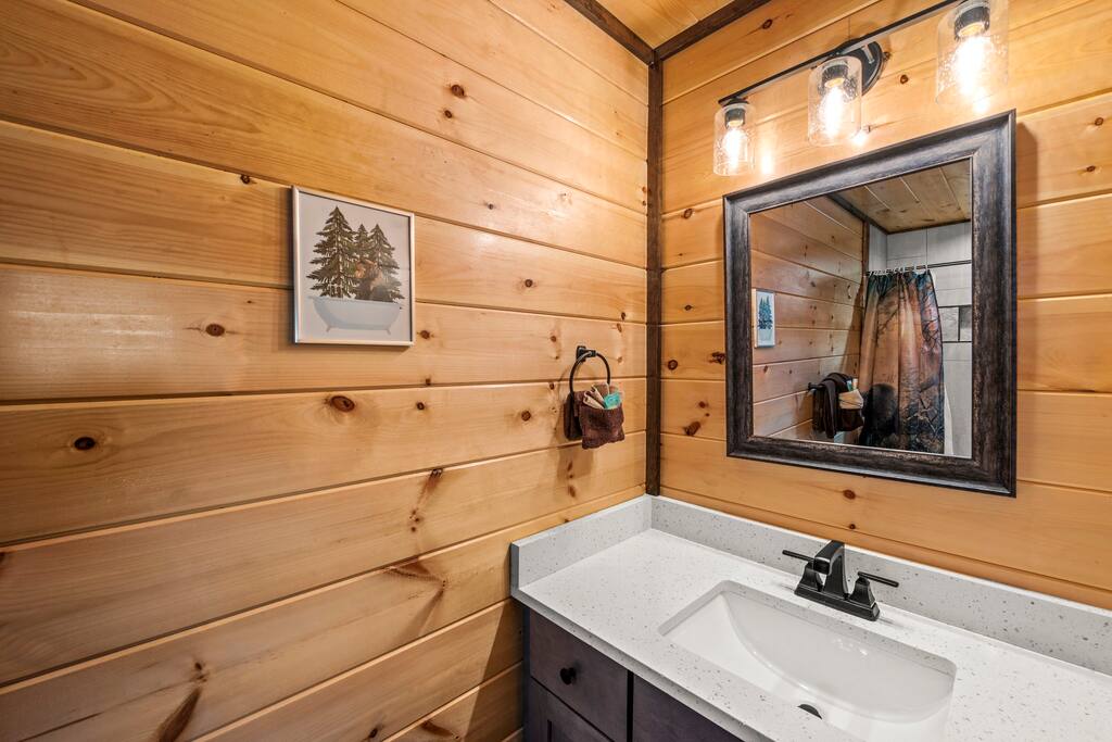 Bathroom features quartz countertops. Bathroom features quartz countertops. - Overlook Swim Lodge - Sevierville