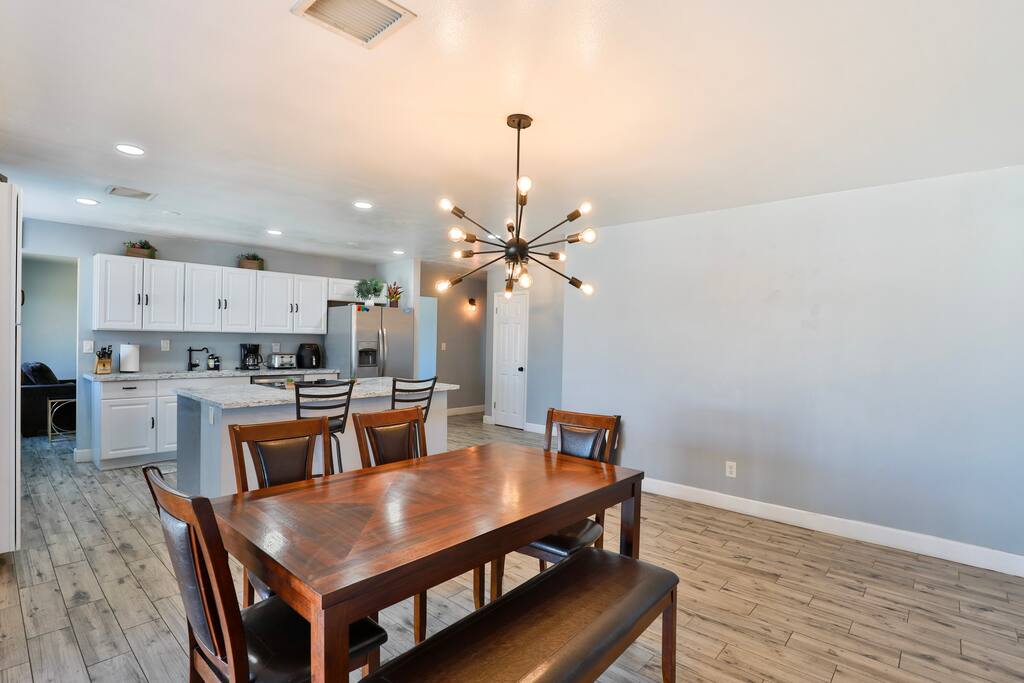 Wooden dining table with 4 chairs and 1 bench