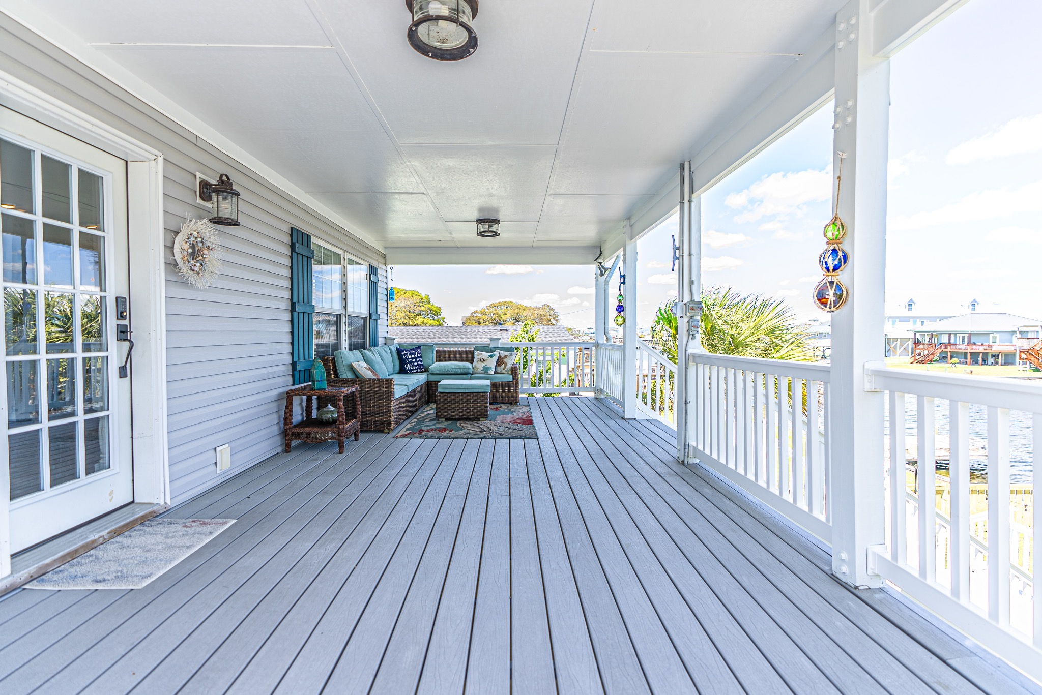 Balcony with seating - Banchy's Bungalow! A Short Walk to Beach - Surf City