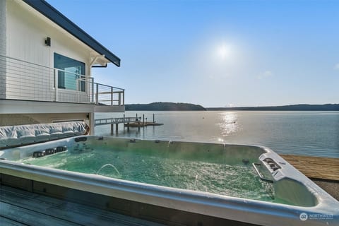 Large Swimspa hot tub enough room for 10. Relax while you enjoy the view.