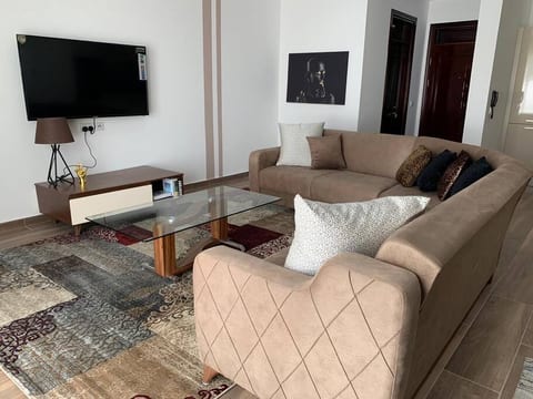 Living Room with Flat screen television and comfortable chairs