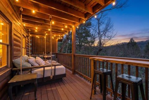 Swinging bed on main level deck