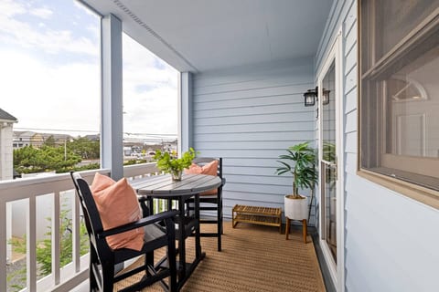 Enjoy the coastal breeze while relaxing on the deck. Bistro table for two.