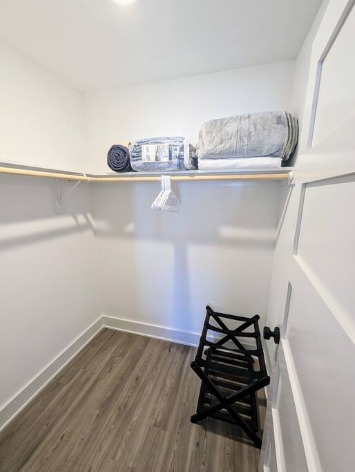 Luggage rack for your convenience in Master BR walk-in closet - SunRise 'n Shine Beach House, OBX - Corolla