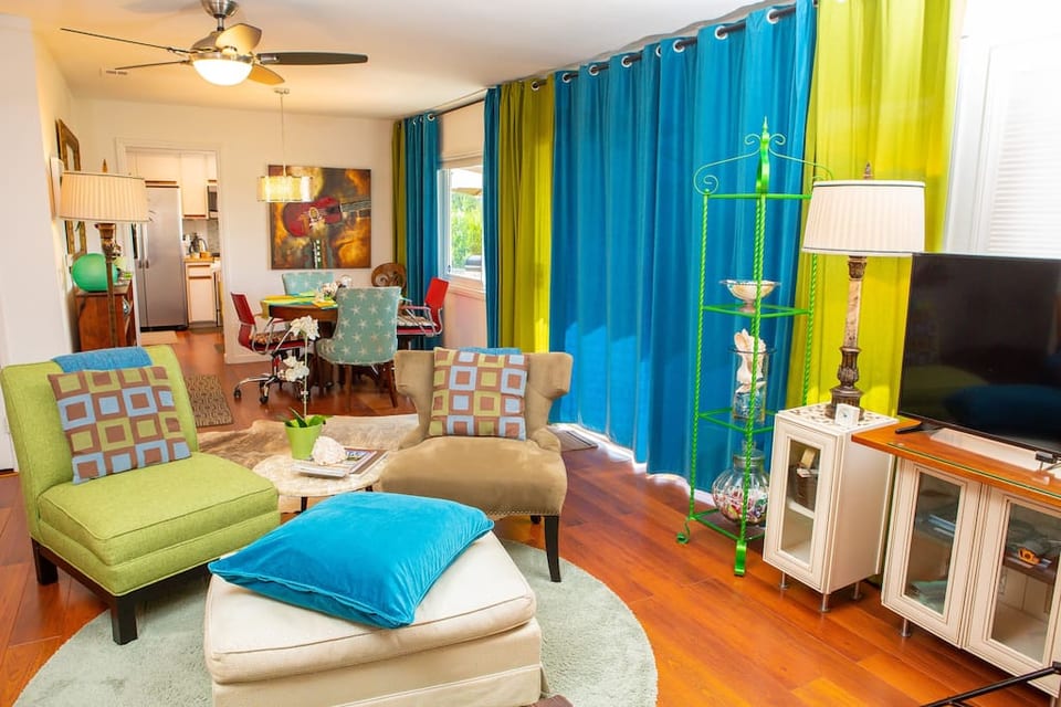 Home is decorated with a modern, colorful flair.  It's a very happy home.