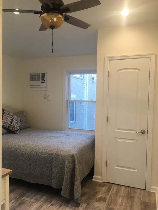 Full size bedroom - “Tilt A Whirl “ Beach House -Parking for 6 cars - Queens County