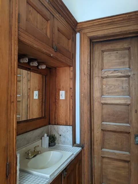 private dressing room with a sink.