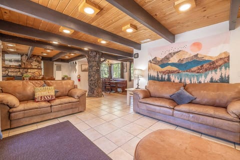 Enjoy family time in the large open concept living room featuring french doors for an indoor-outdoor experience
