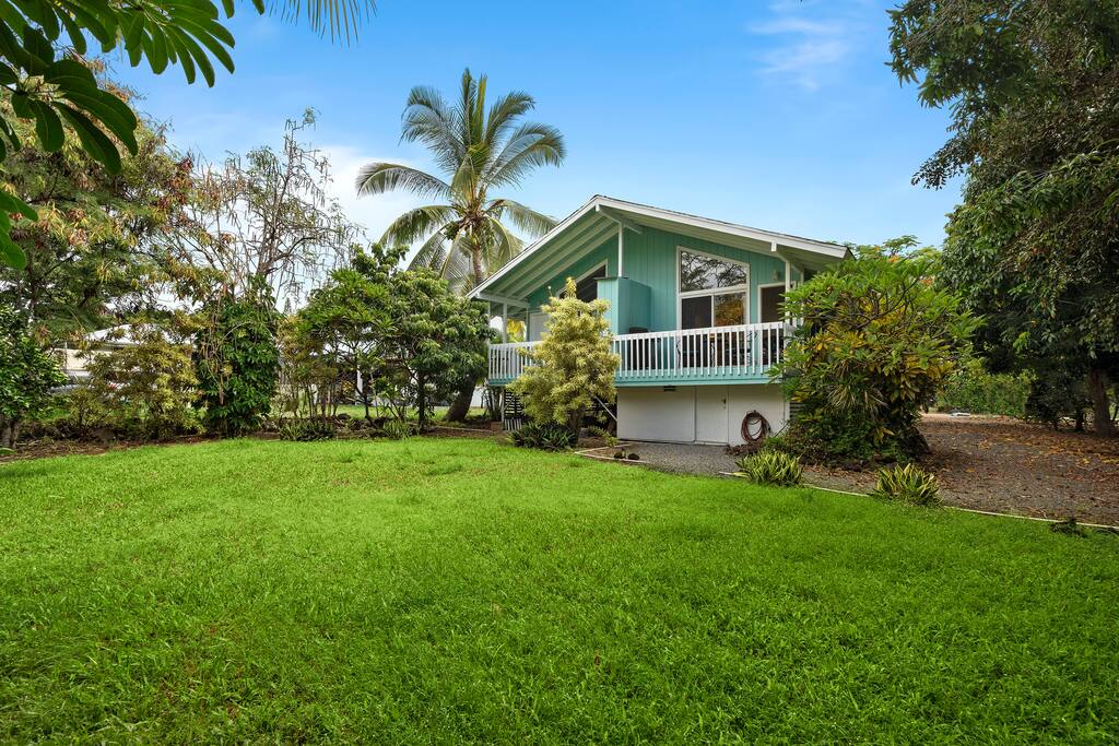 Experience the island life in the amazing private backyard full of mature tropical plants and trees - New A/C Central Kona Surf House 4bd/4bth Sleeps8 - Kona