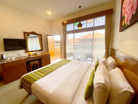 Nice room near the beach and with Balinese design