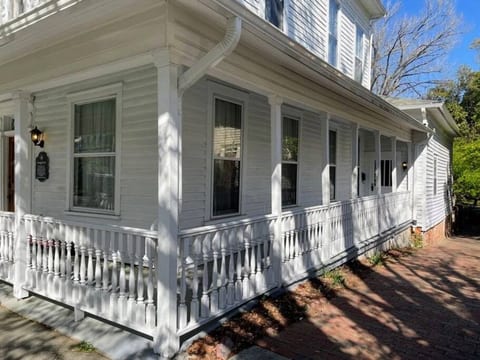 Wraparound porch with newly added (not shown) rocking chairs on the front. Watch the horse drawn carriage walk by and enjoy!