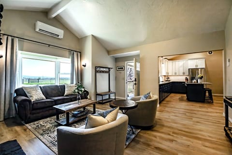 Living room opens up to kitchen and dining area.
