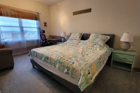 Master bedroom with king bed and pull out twin sofa