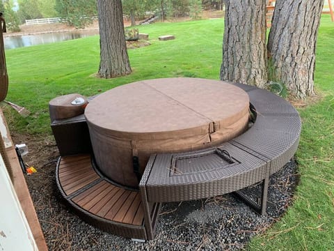 Evergreen soft tub.  Just added.  Wonderful view of Broken Top and the Three Sisters from the comfy tub. 
Look to east and you see the pond and waterfall.