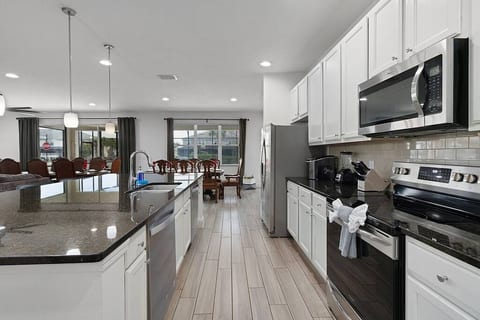 Beautiful Chef's Kitchen with 2 Fridge/freezers, 2 dishwashers, plenty of appliances, cookware and dinnerware