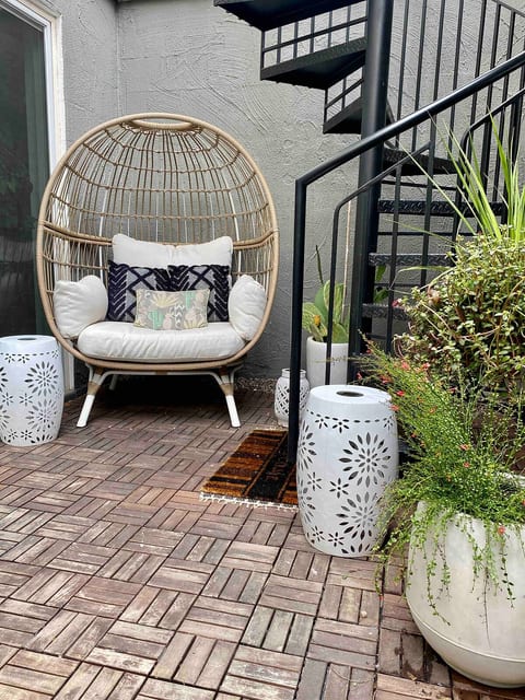 Just off the dining room, the cozy private patio is the perfect spot for enjoying desert nights and perfect AZ weather. Features a custom mural, instaworthy egg chair, dining table and cozy bistro lights. There is also a propane grill  for bbq'ing!