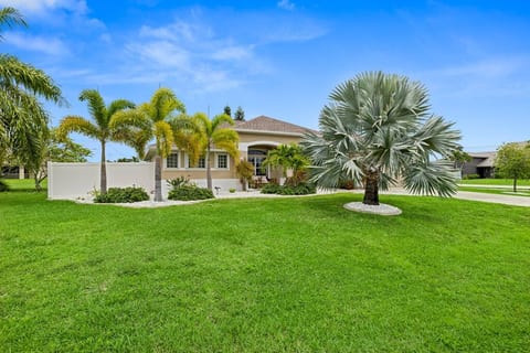 Front of house view - Please note the white fence has been replaced with a chain-link fence and living privacy fence.