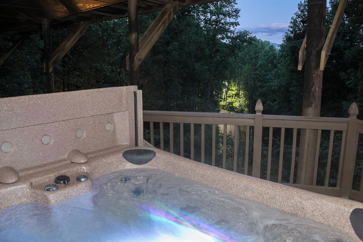 Lighted hot tub as dusk.