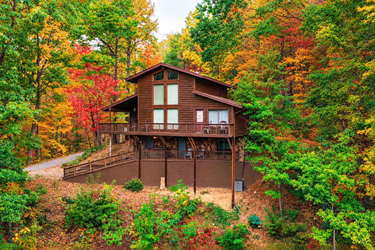 Fall colors surround the cabin.