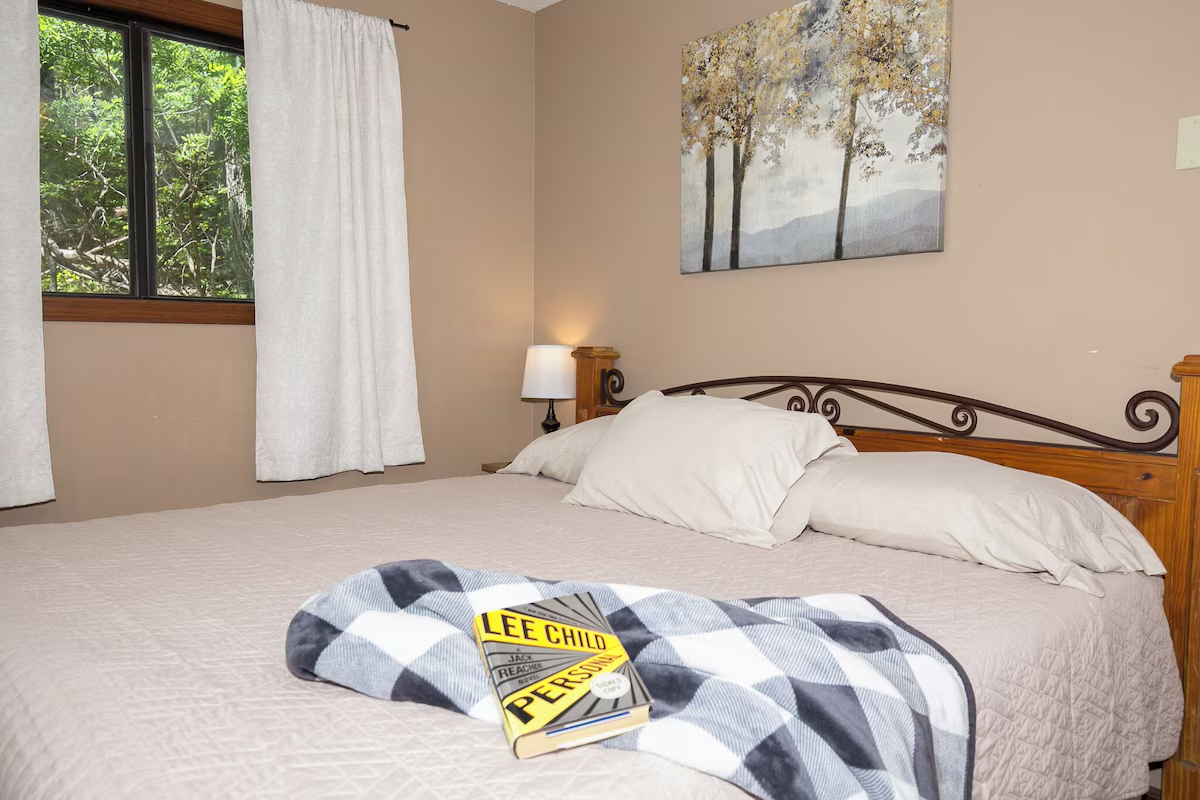 Cozy up with a book in the upstairs king bedroom.