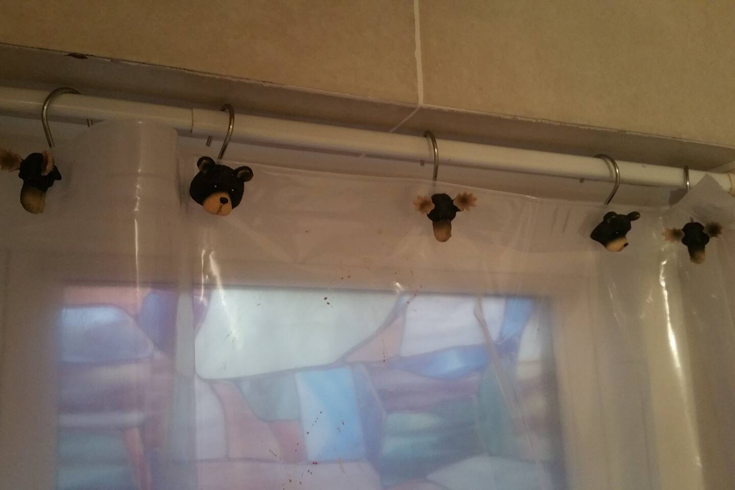 Okay, now my wife has just gone nuts with the rustic lodge theme....But the window privacy clings now match the new river rock tiles. Lol