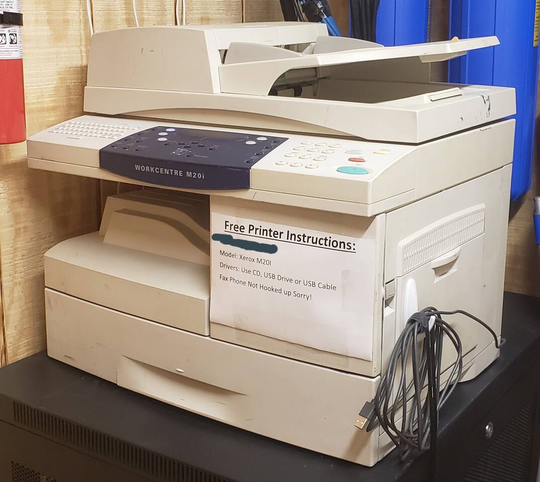 If you are working from home, kids have homework, or you need to print out some last minute coupons for your trip...we give you access to a high end printer/copier/scanner. Drivers included!  Also big unit under it is the server with internet & cable.