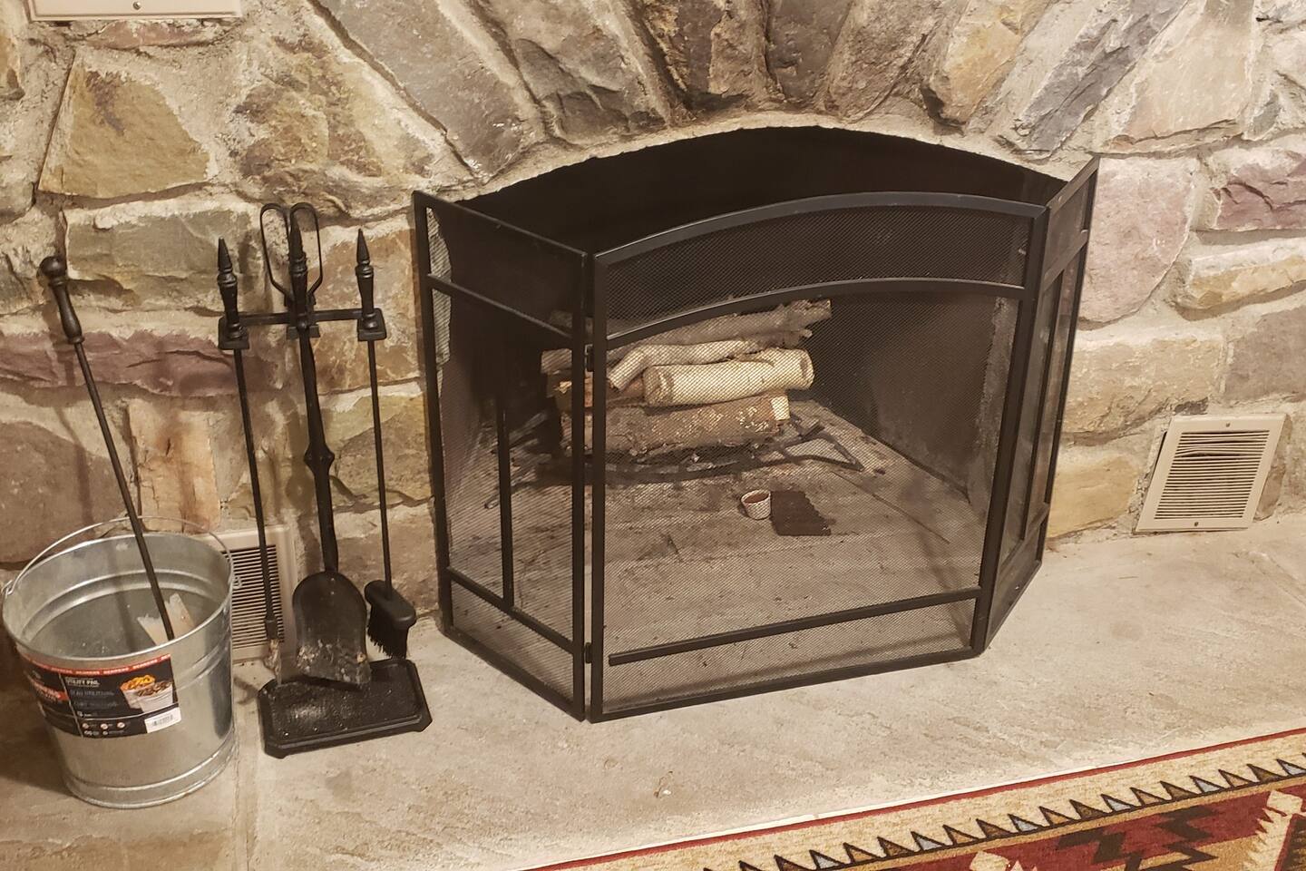 House boasts two fireplaces, each has fireplace tools, will contain a load of firewood for your use, and basement has a bucket for easy clean out before check out. ((Guests are required to clean out fireplace after they use it before they check out))