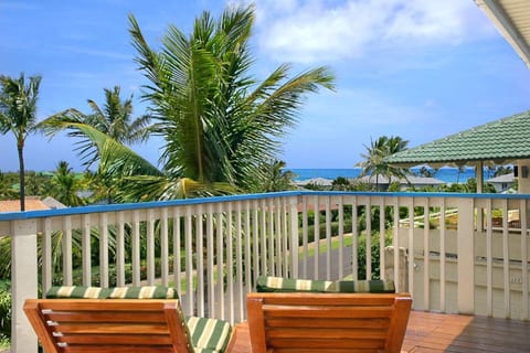 Watch the ocean view from the second floor expansive lanai with 6 chaise lounges