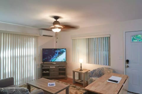 Living area, cafe table, front door.
